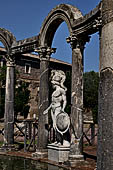 Villa Adriana - The Canopo, statue of the semicircular Euripus representing a young warrior wearing a tall helmet, the so-called 